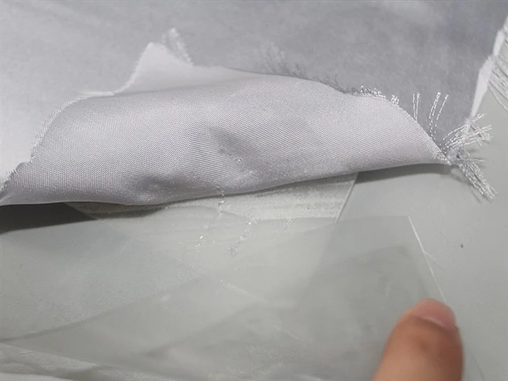 hot melt adhesive film for laminating the cotton fabric